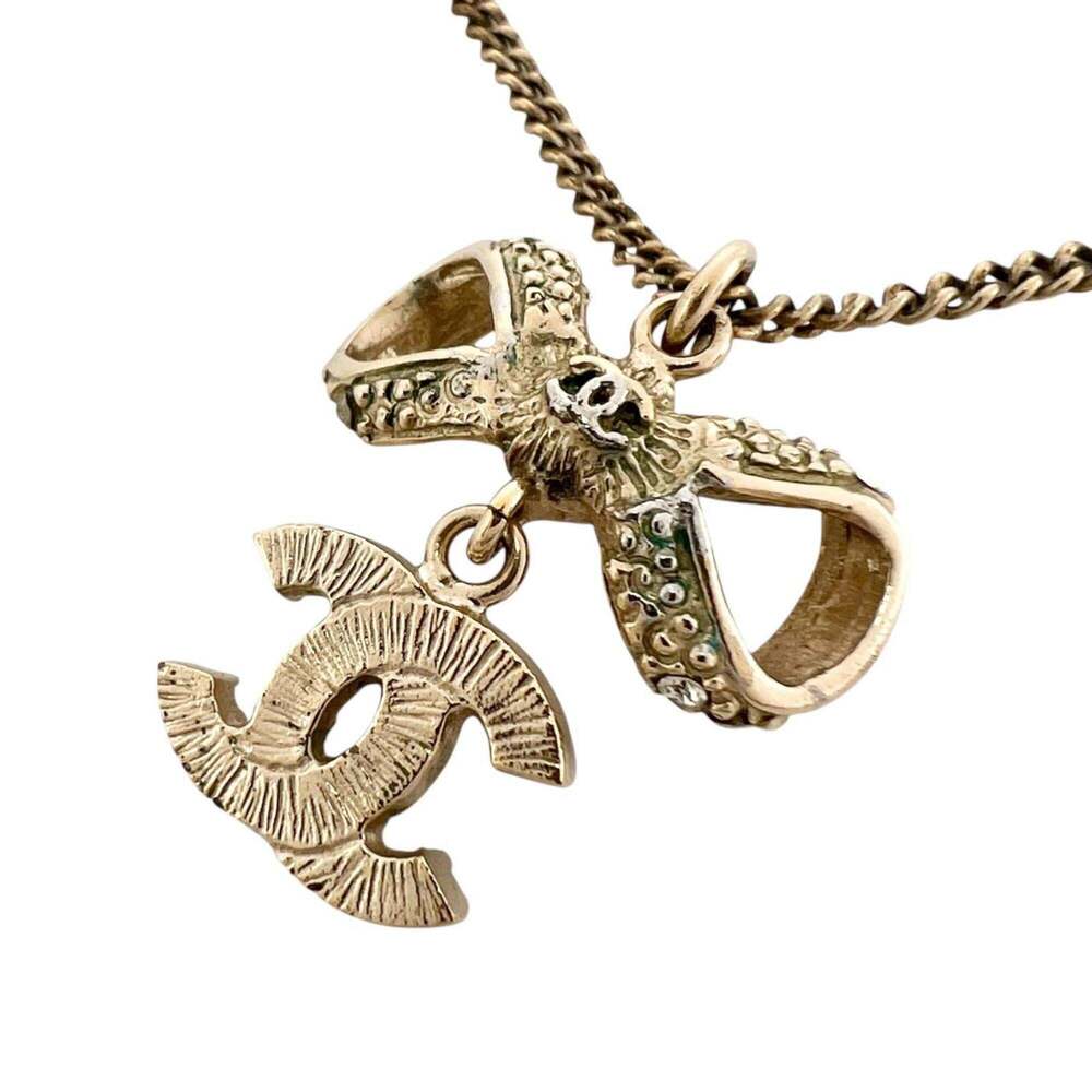 CHANEL Gold Logo Necklace - Picture 2 of 7